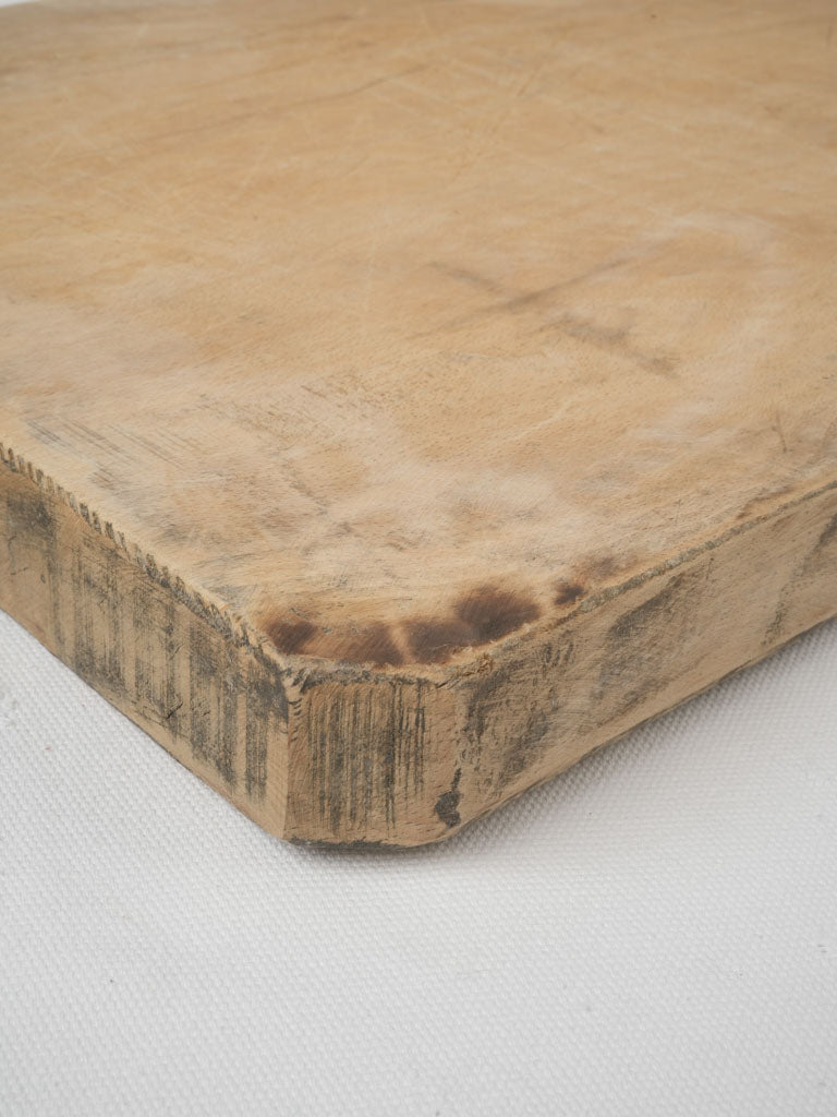 Old-fashioned, aged beechwood serving board