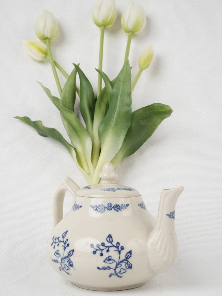 Intricate historic floral earthenware teapot