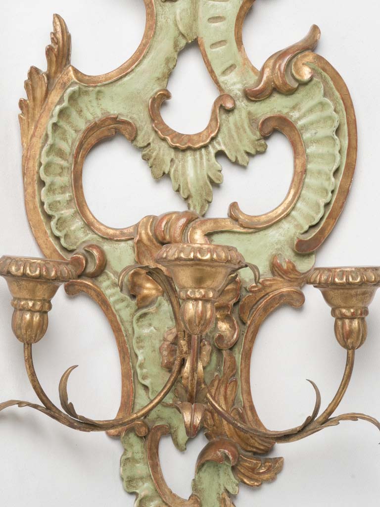 Intricately carved giltwood sconce