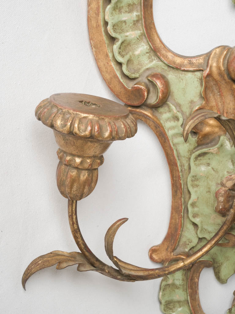 Luxurious ornate giltwood wall sconce