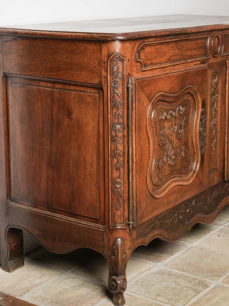 Exquisite Provencal floral-carved walnut bahut