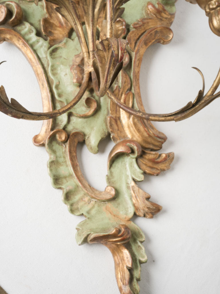 Patina-accented giltwood sconce