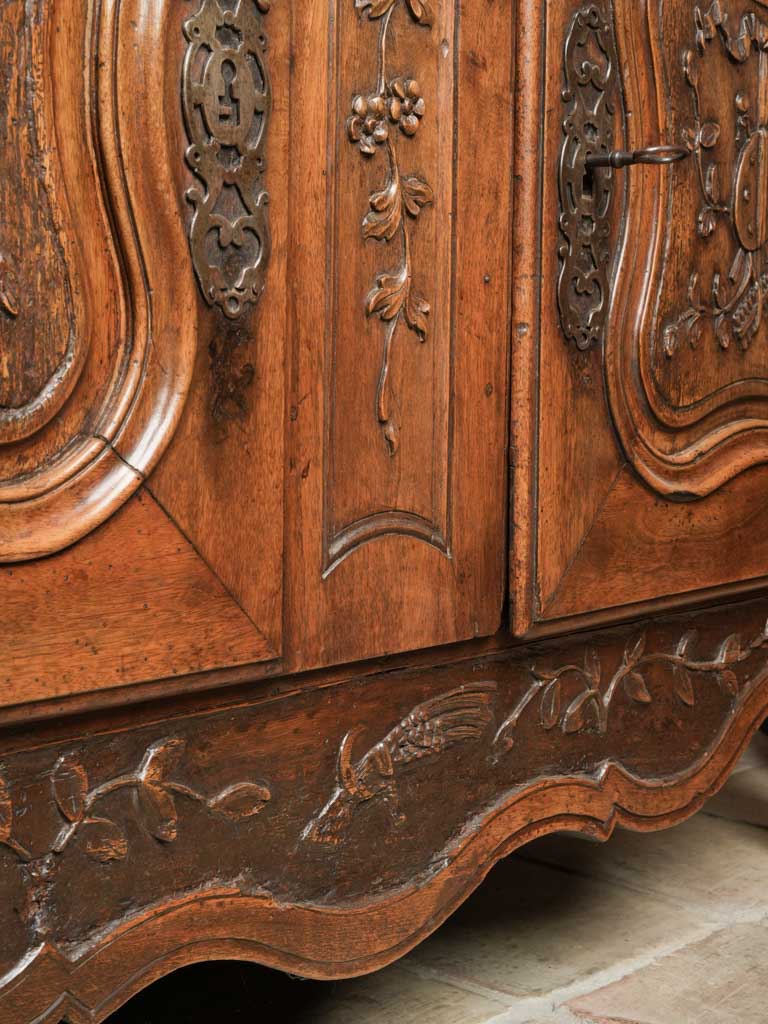 Exquisite Provencal floral-carved walnut bahut