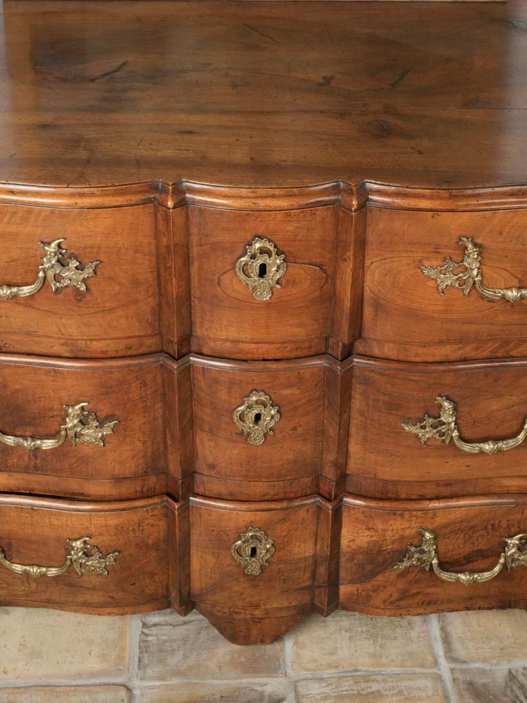 Aged bronze-keyplate adorned commode