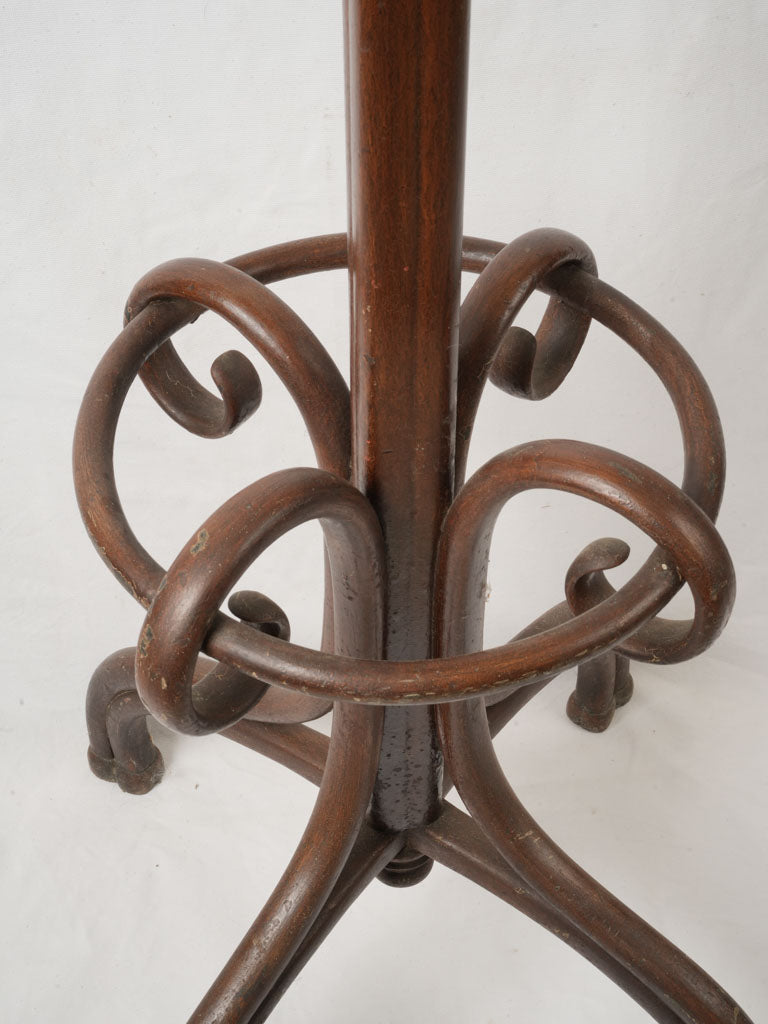 Timeless ornate fluted coat stand