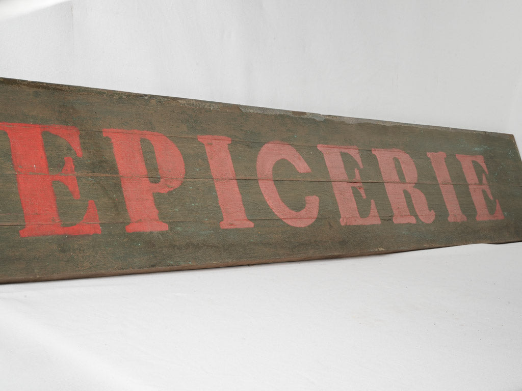 Red green epicerie store sign  