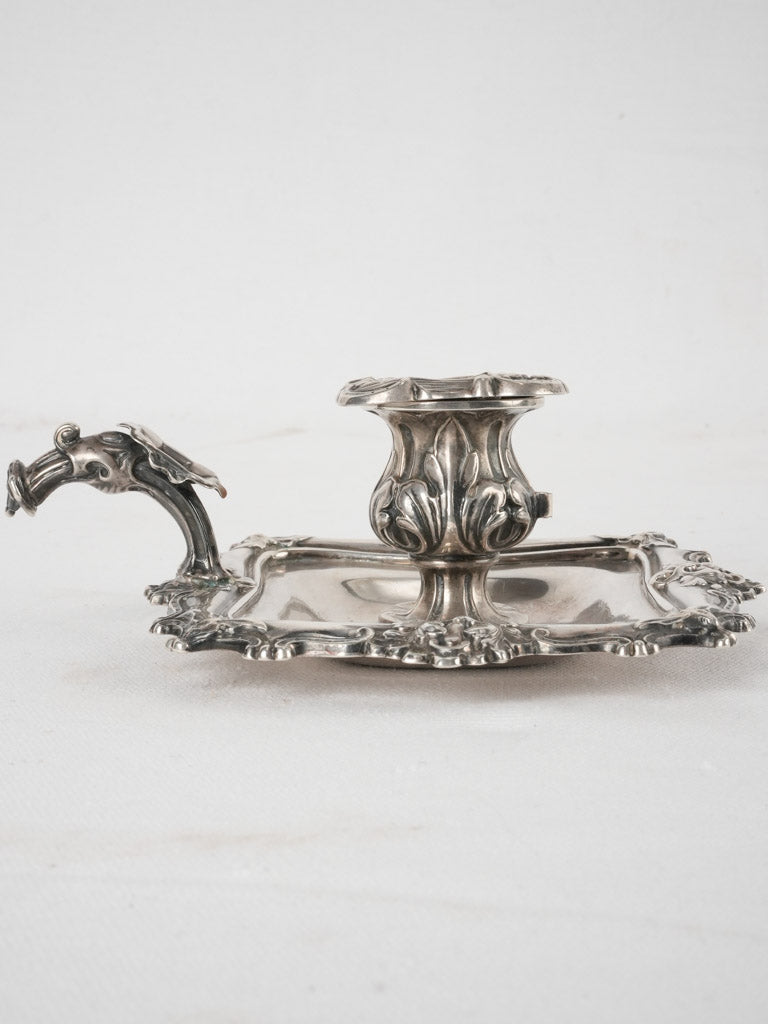 Classic silver handle-equipped candleholder