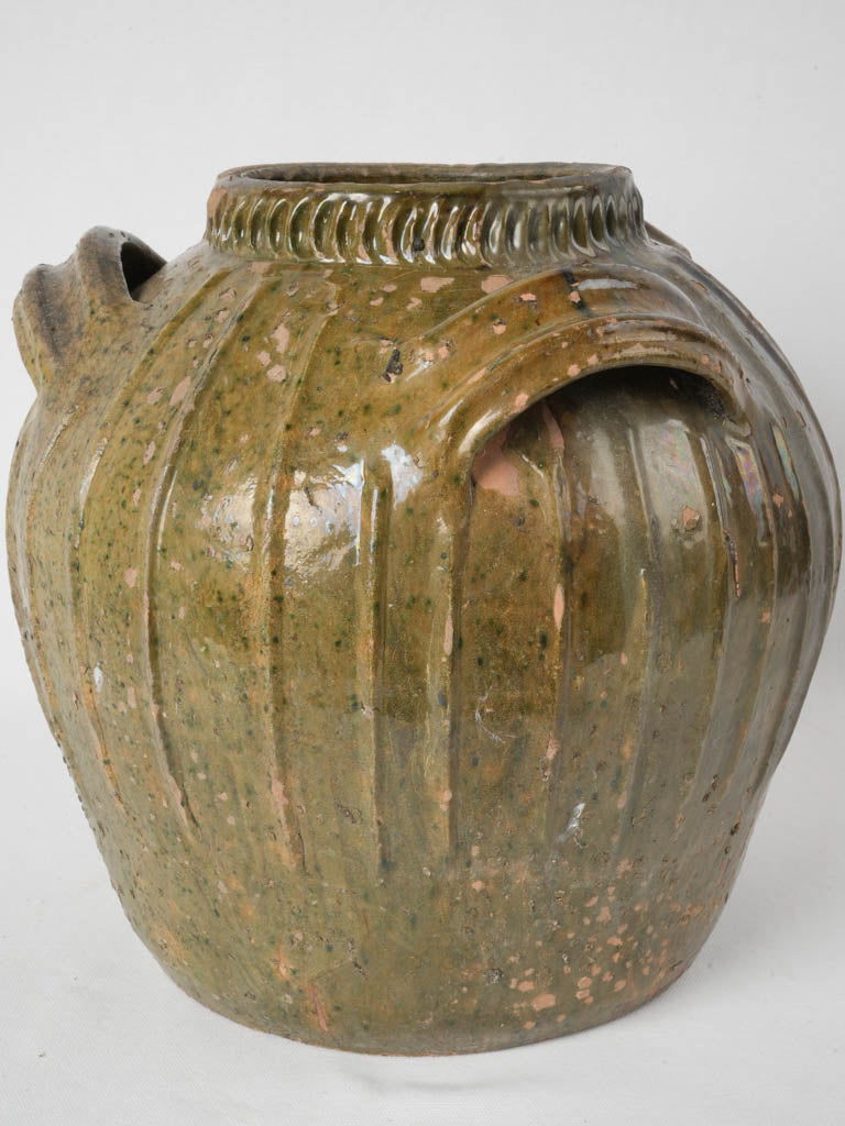 Traditional French olive-green glazed jar