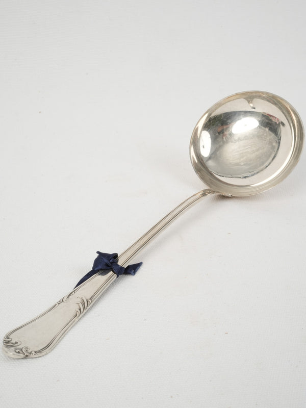 Opulent Louis XV silver-plated ladle