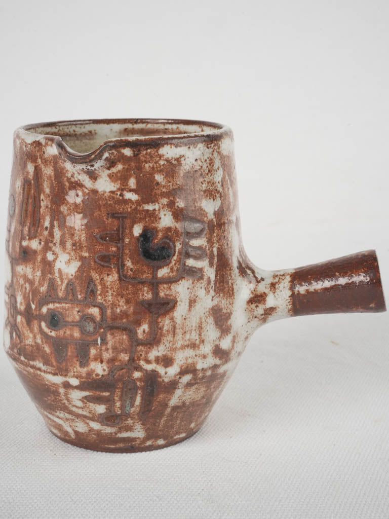 Rustic glazed abstract motif creamer  