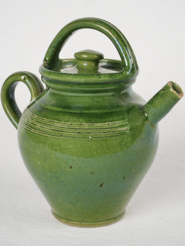 Small lidded pitcher from Savoy w/ green glaze