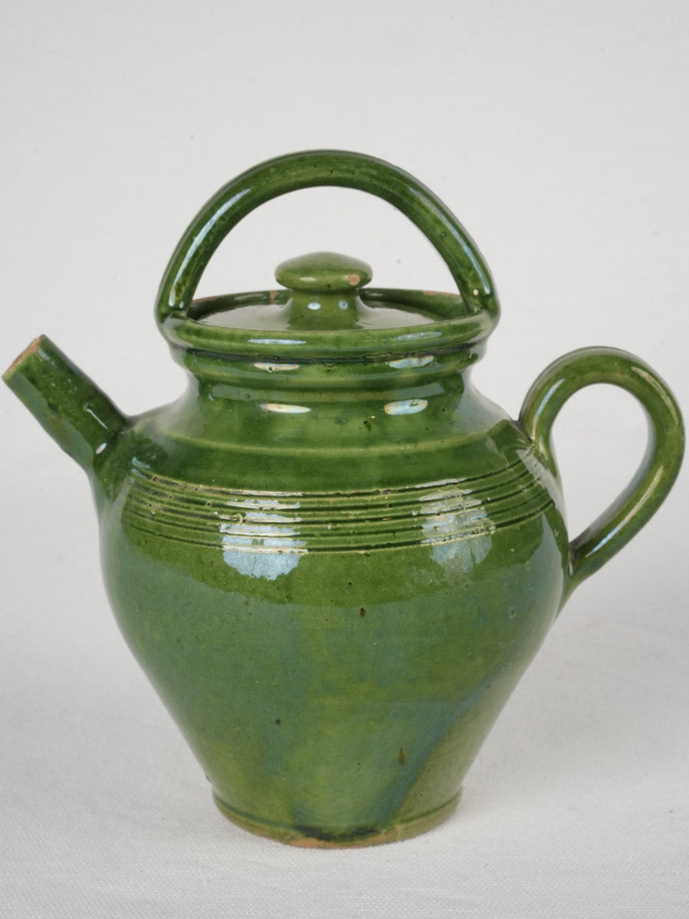 Petite rounded lidded pitcher  