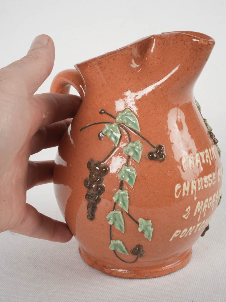 Intricate jaspe glaze decorated pitcher