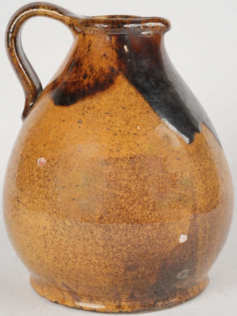 Vintage ocher stoneware pitcher