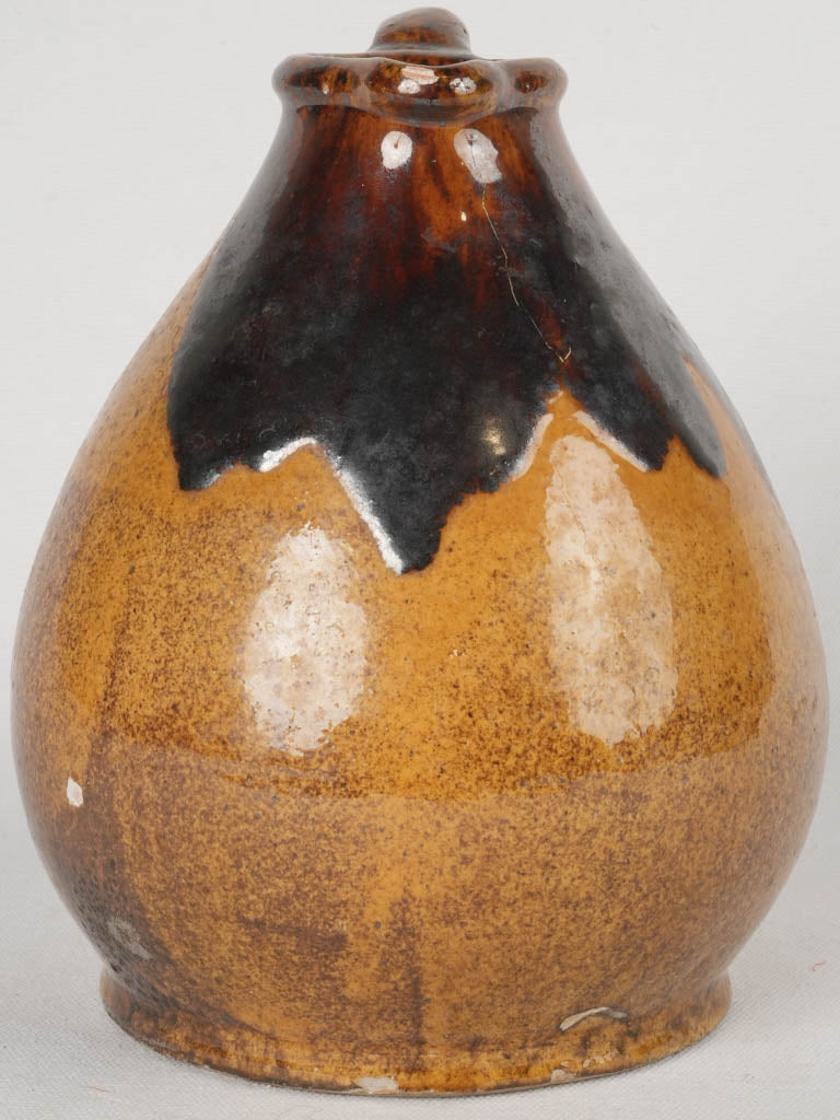 Earthy glazed stoneware pitcher