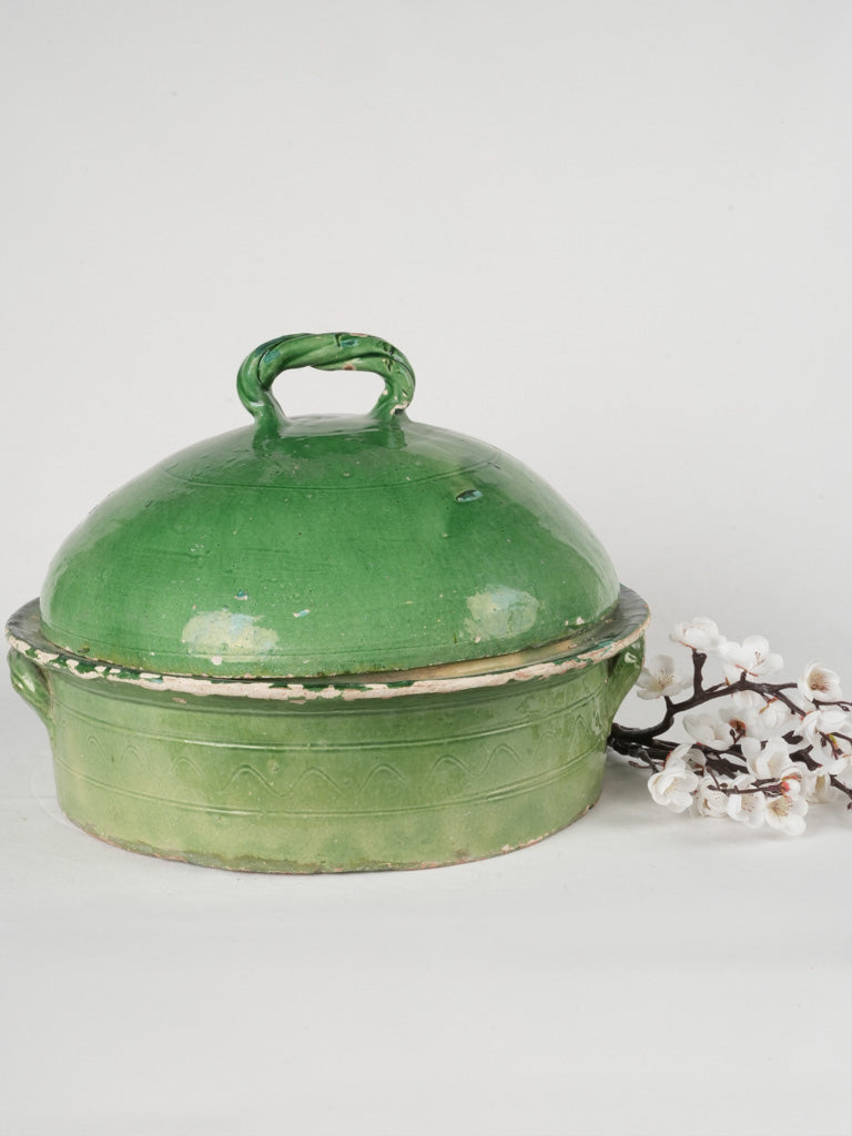 Lustrous emerald glazed cookware piece