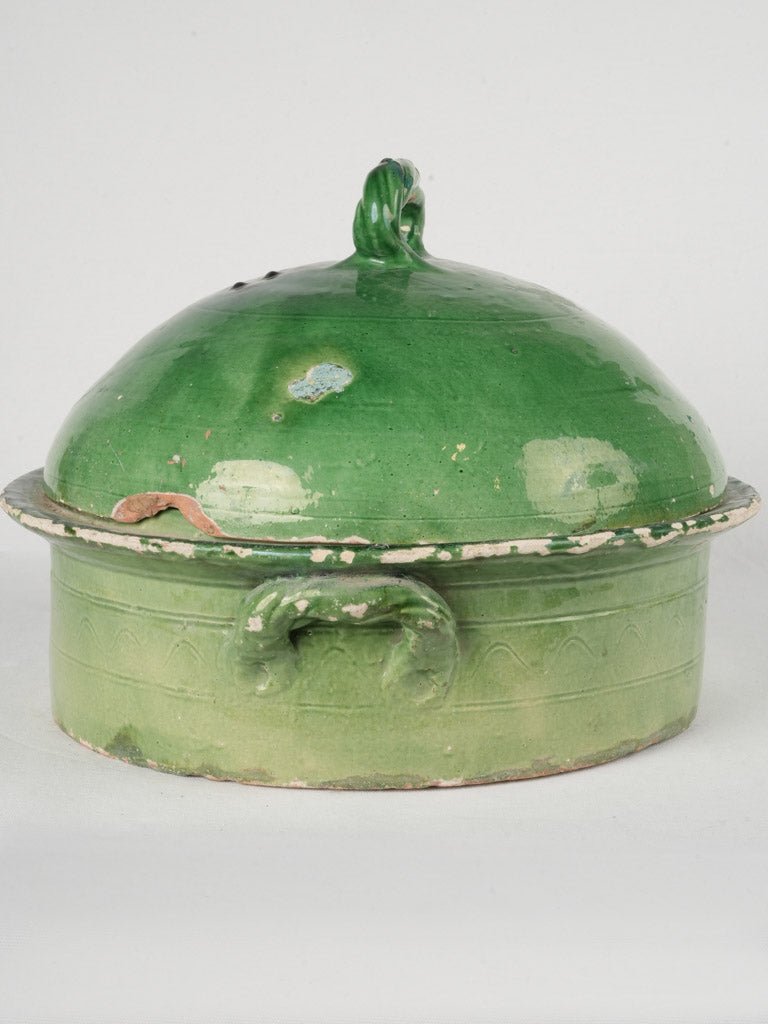 Ornate emerald green lidded pot