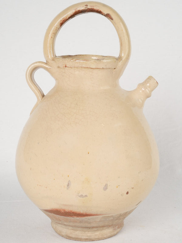 Antique French water pitcher w/ pale yellow glaze from Aubagne 14½"