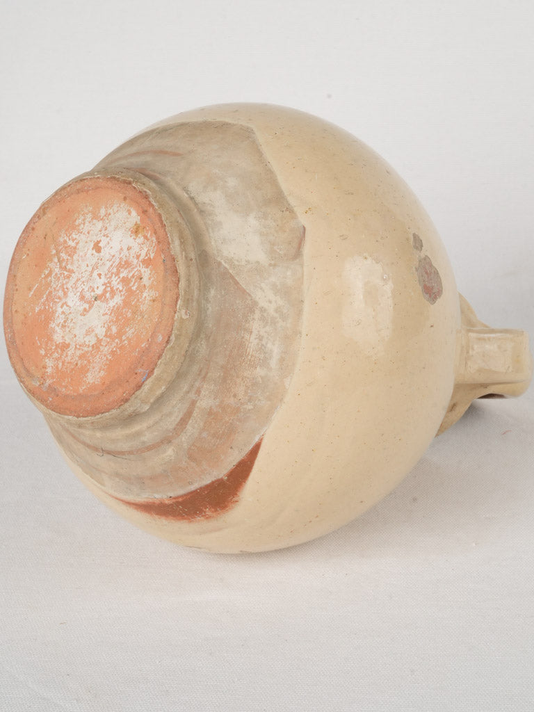 Aged terracotta Aubagne water pitcher