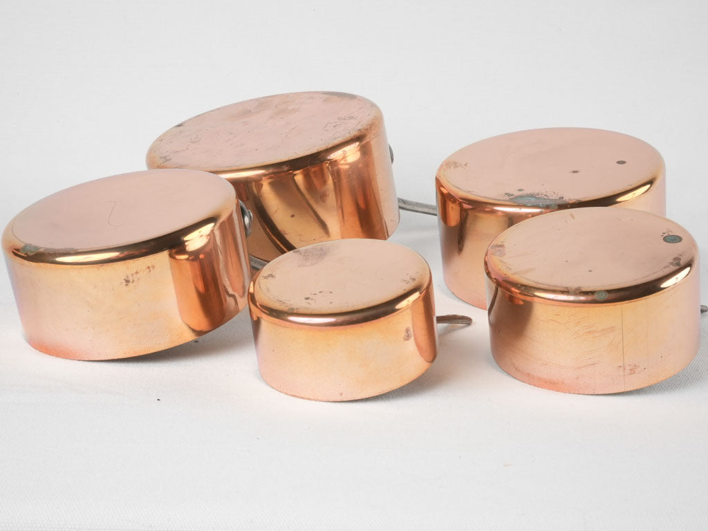 Timeless copper French saucepan stack