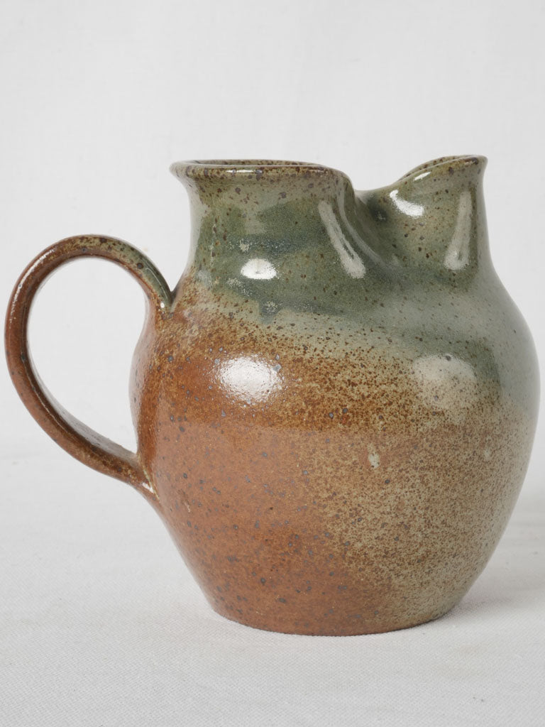 Refined natural glazed stoneware pitcher