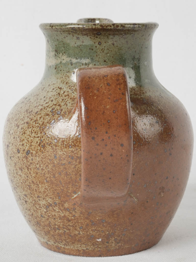 Rustic pinched spout ceramic pitcher