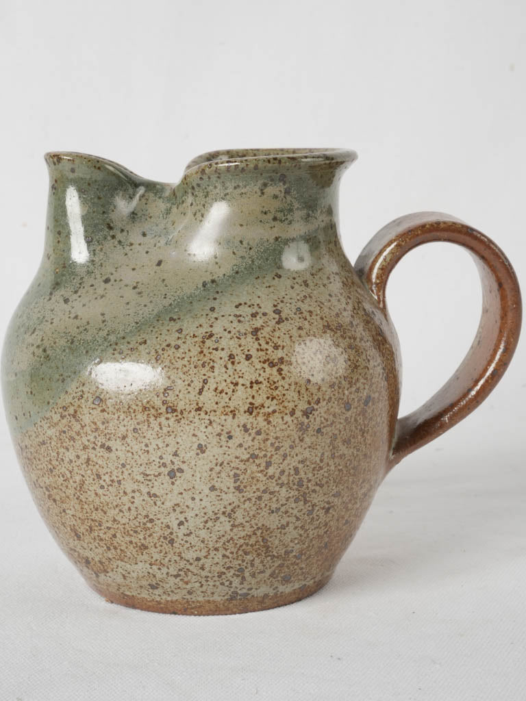 Elegant brown-green stoneware pitcher