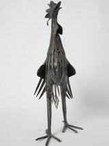 Whimsical metal rooster statuette