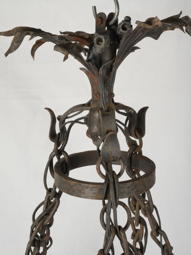 Resilient hand-hammered iron chandelier