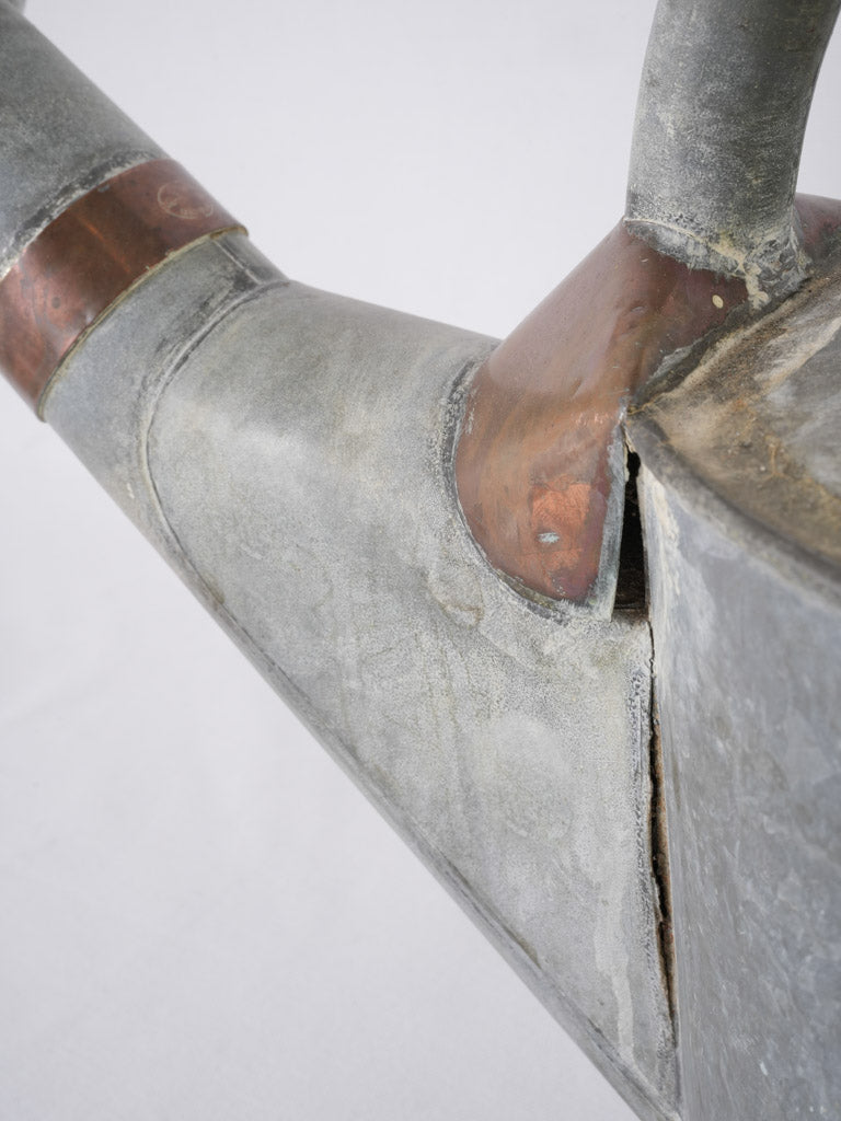 Decorative aged French watering can