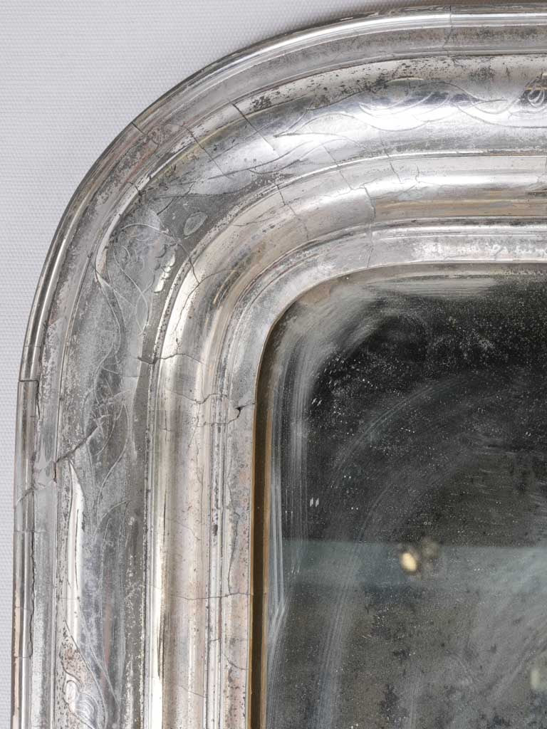 Ornate 19th-century French silver-leaf mirror