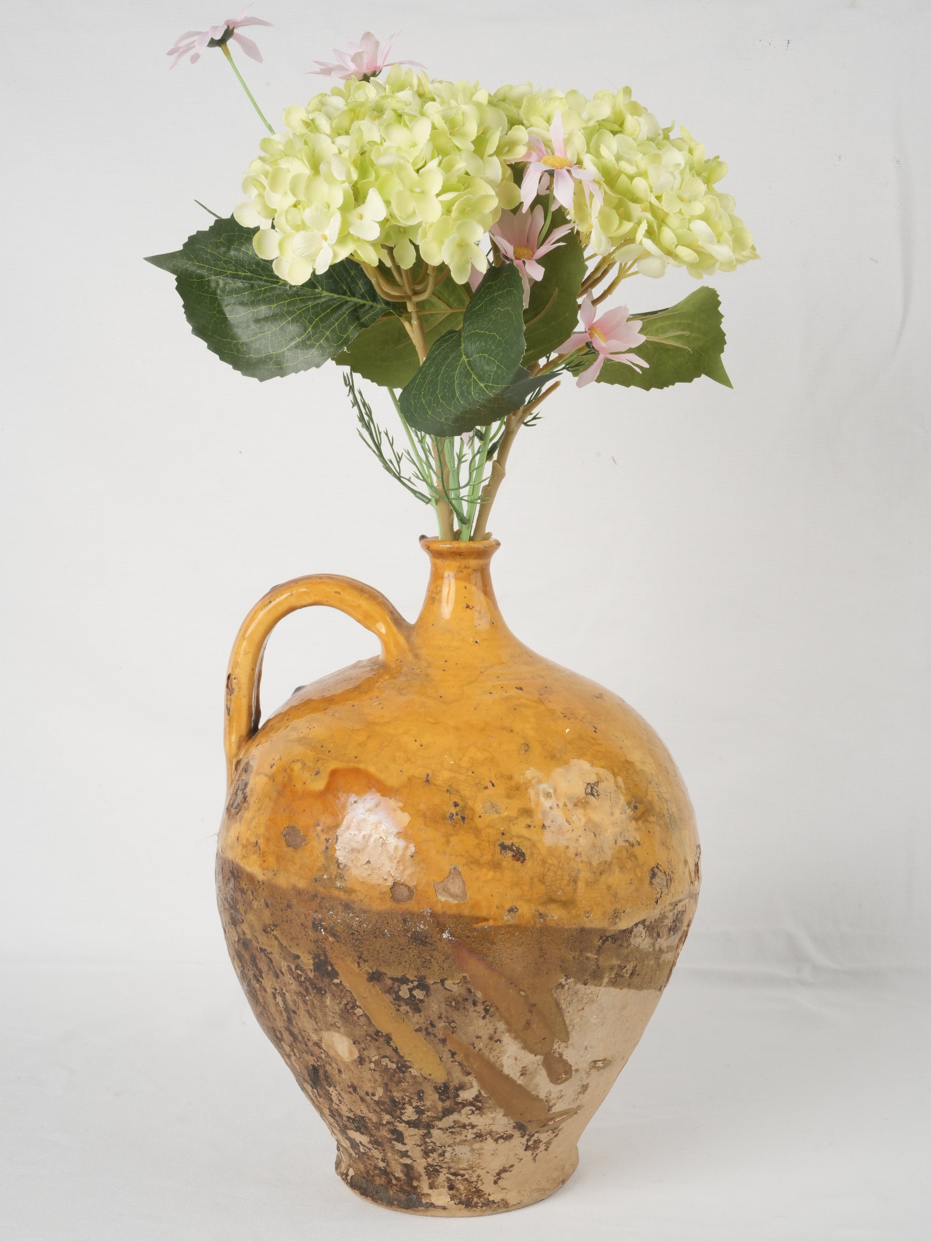 Aged French pottery wine pitcher