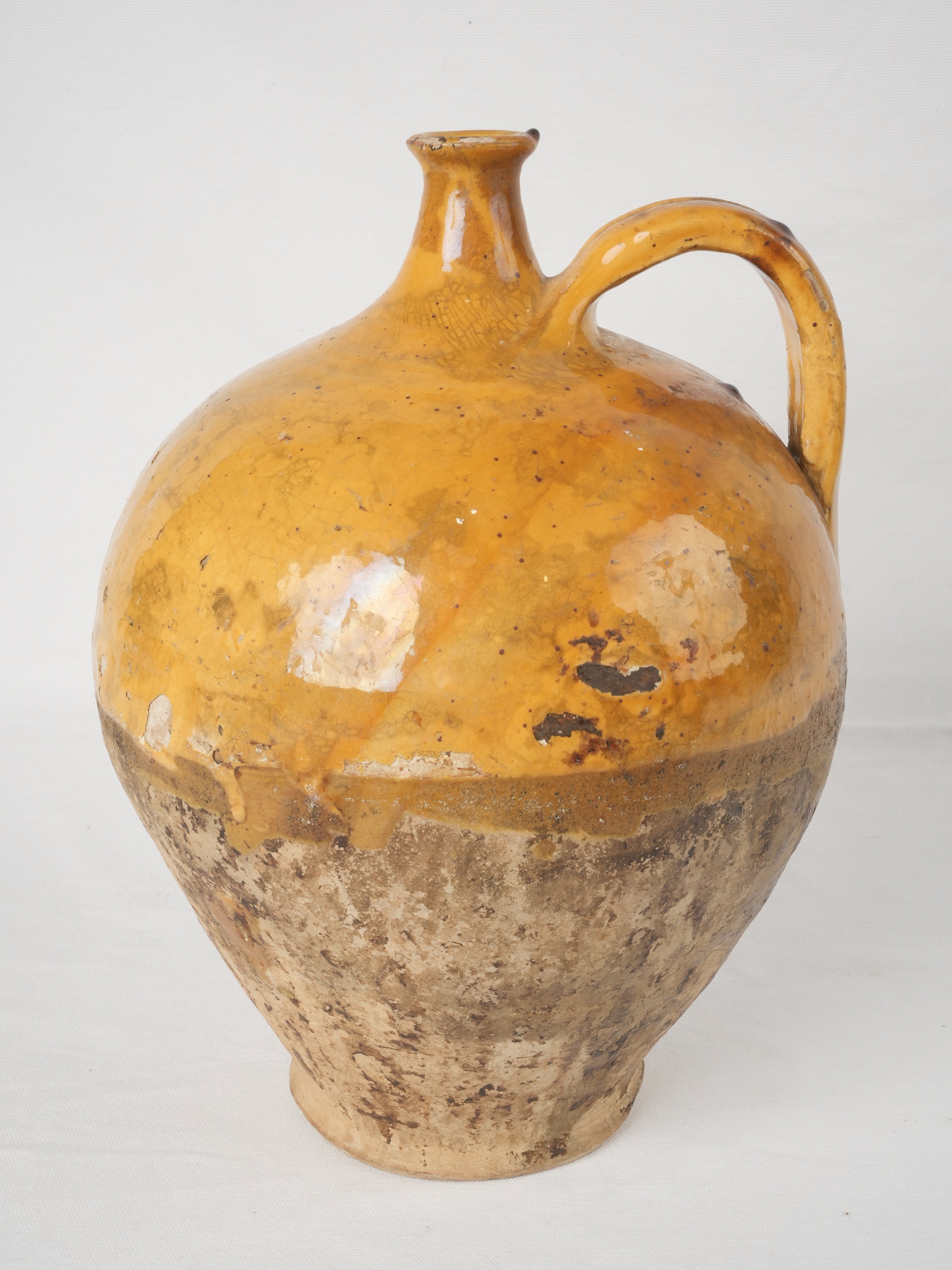 Aged yellow ocher wine decanter