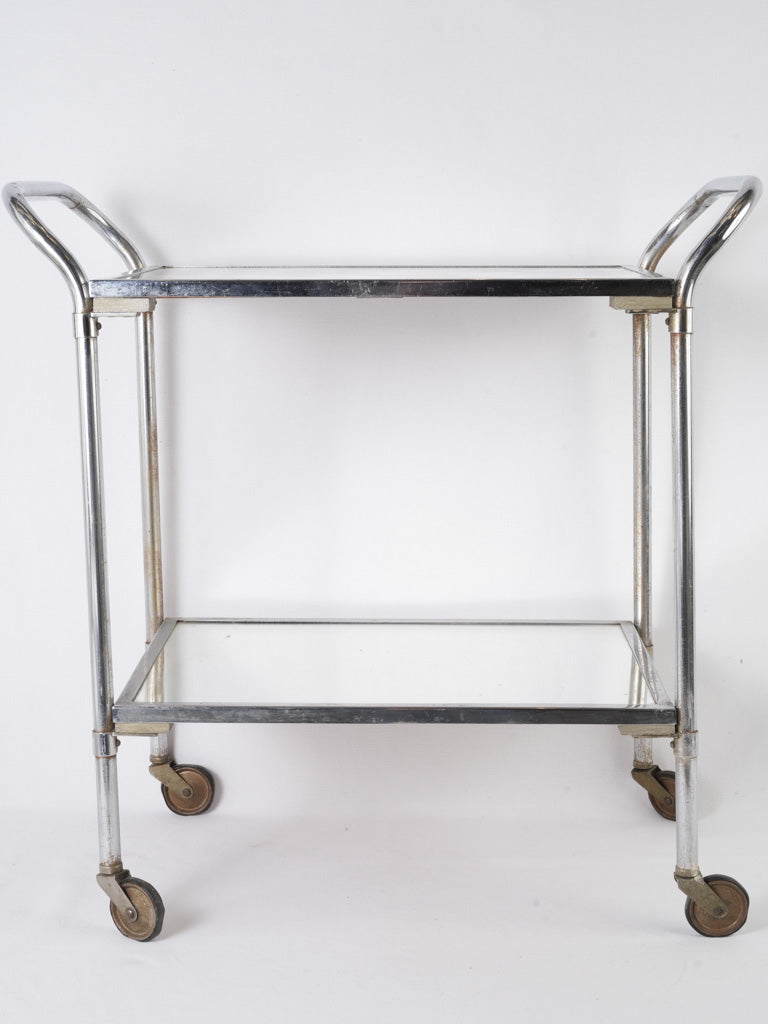 Sleek 1970s chrome serving cart