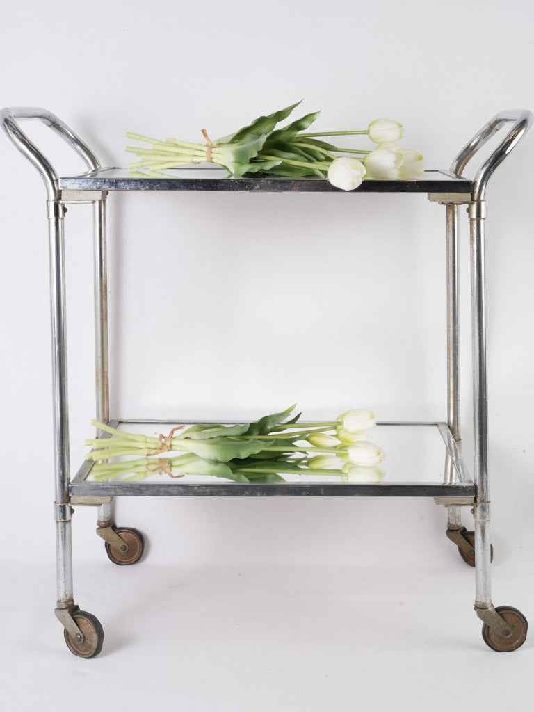 Elegant mirrored rolling dessert trolley