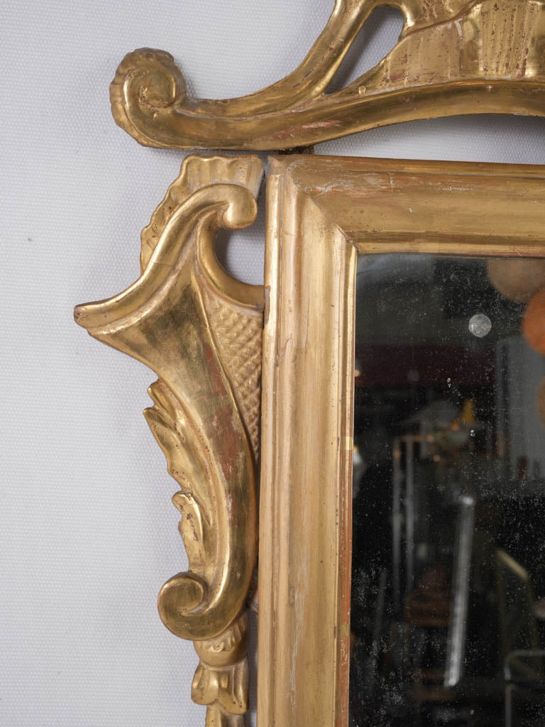 Opulent Italian giltwood antique mirror