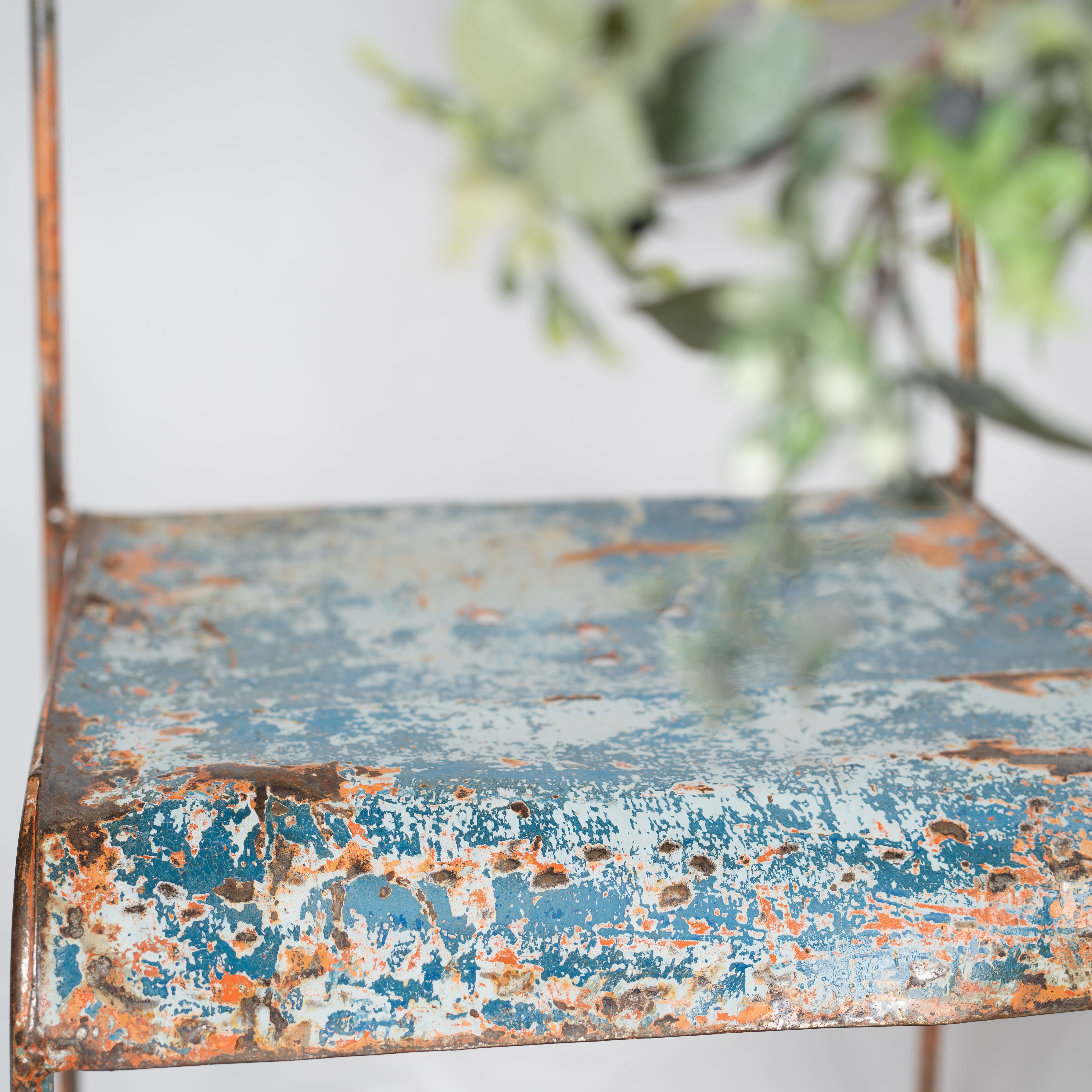 Retro worn-out metal seating