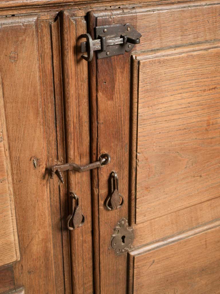 Intricate iron-hardware armoire  