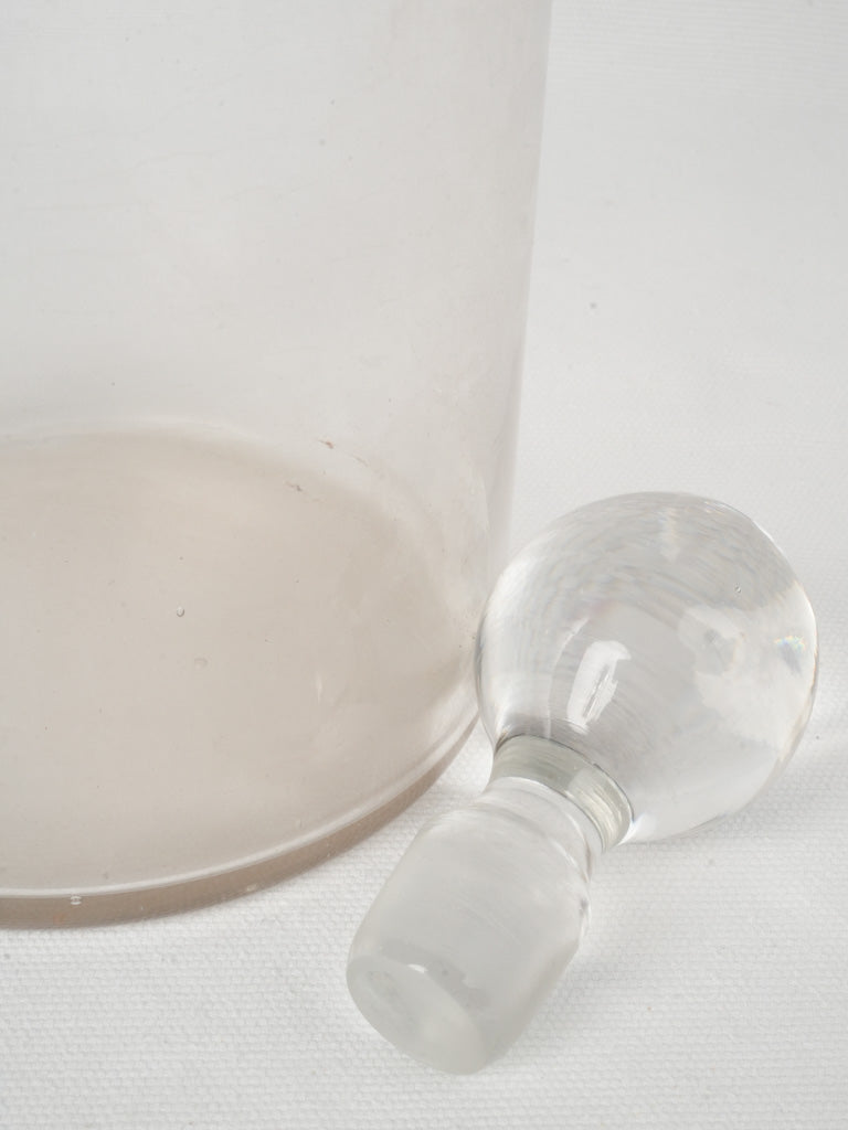 Early 20th-century clear glass bottle