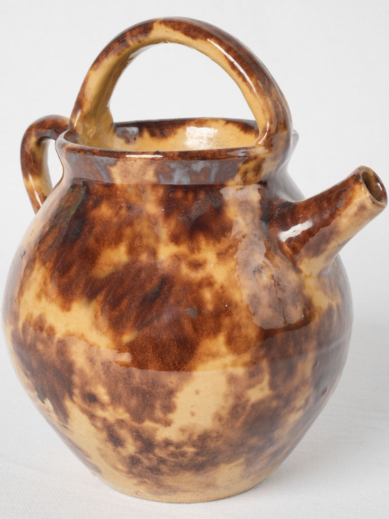 Antique Provencal brown-yellow glazed pitcher