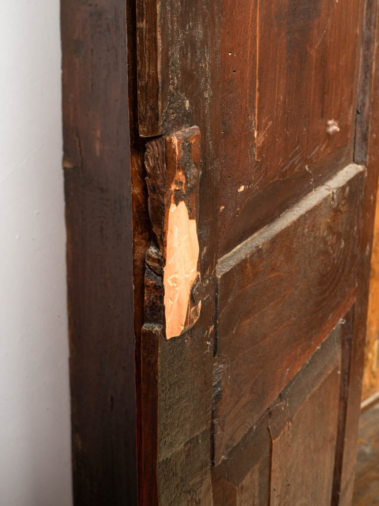 Distinctive warm-toned wooden armoire  