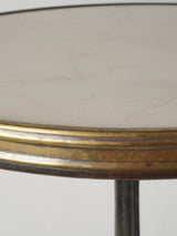 Sleek marble top brass brace