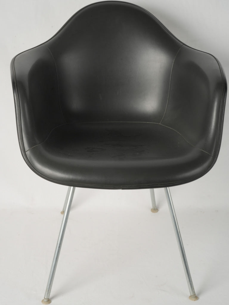 Classic ergonomic Eames armchairs