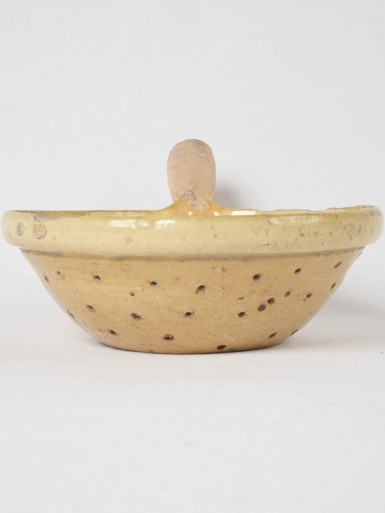 Vintage yellow glazed terracotta berry sieve