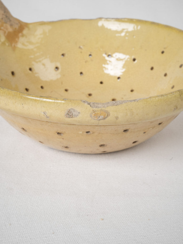 Yellow glazed terracotta antique fruit strainer