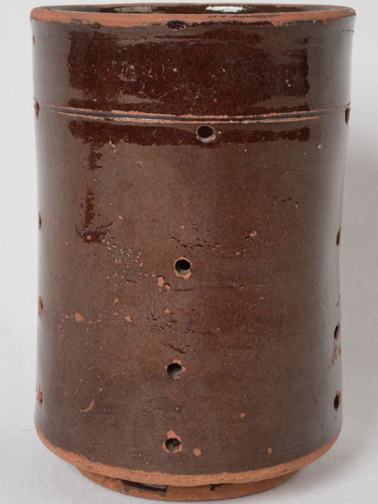 Perforated old brown glaze strainer