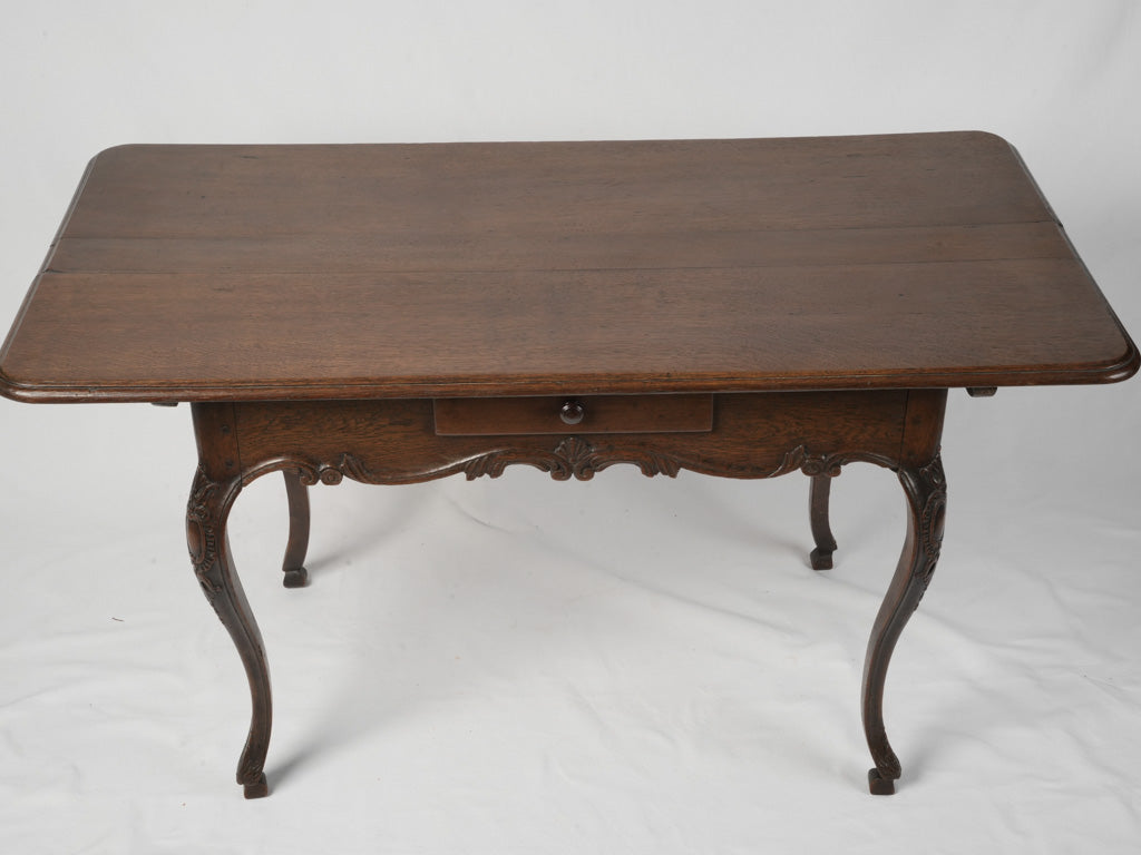 Aged cabriole legged console table