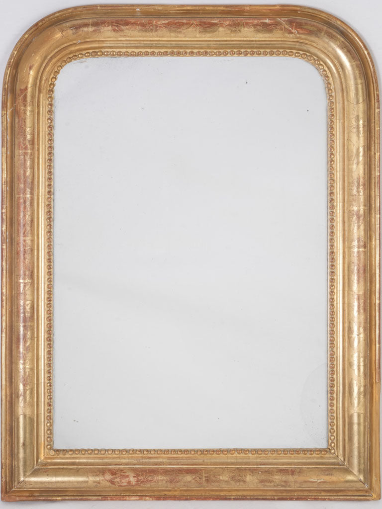 Elegant 19th-century gold leaf mirror