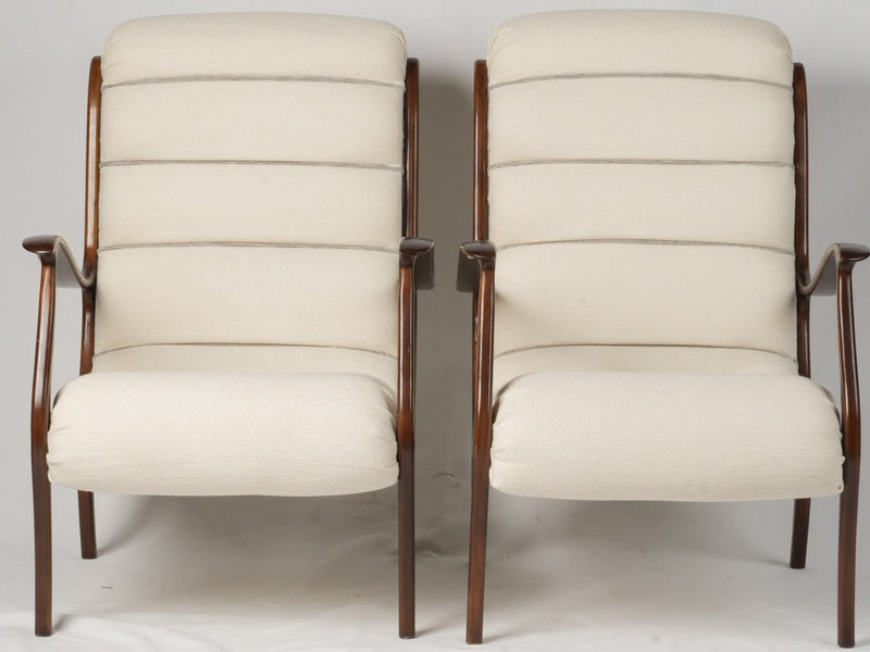 Innovative, robust, mid-century, armchairs