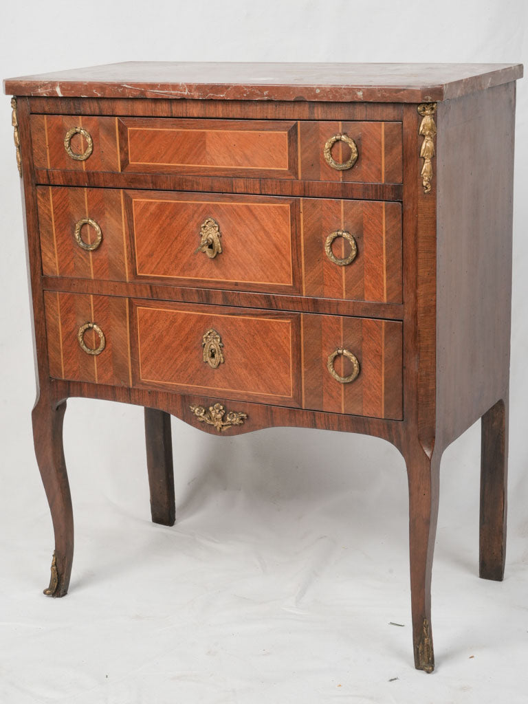 Luxurious marble-topped cabinet  